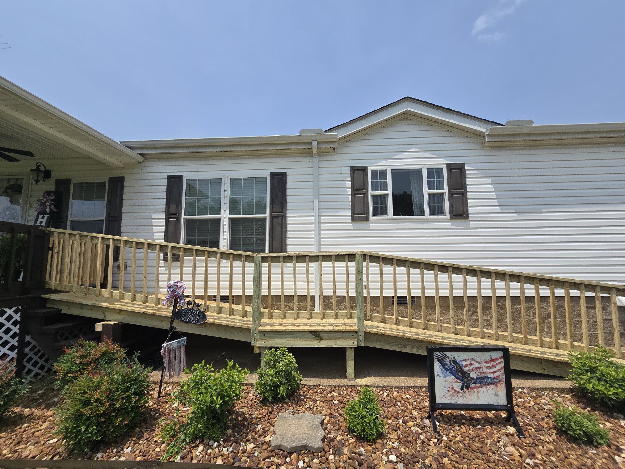 Long residential deck ramp leading from the home to the yard