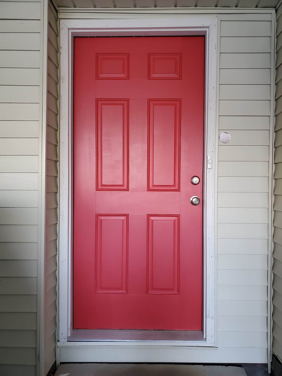 Finished red exterior entry door