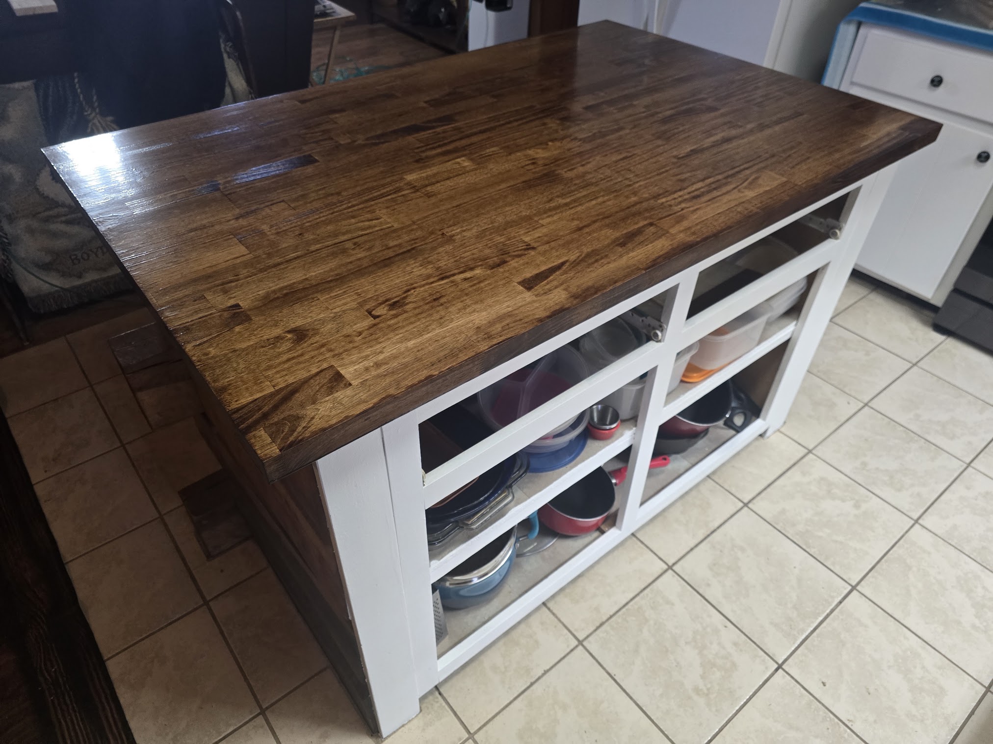 Custom kitchen island with butcher-block countertop
