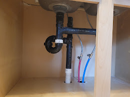 Under-sink plumbing installation
