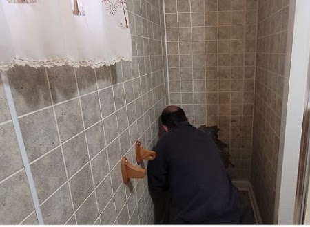 Handy Hands shower tile remodeling work