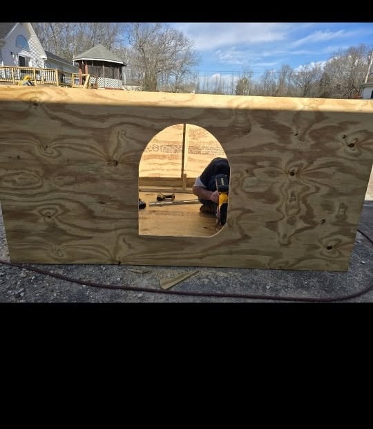 Custom pressure-treated outdoor dog house